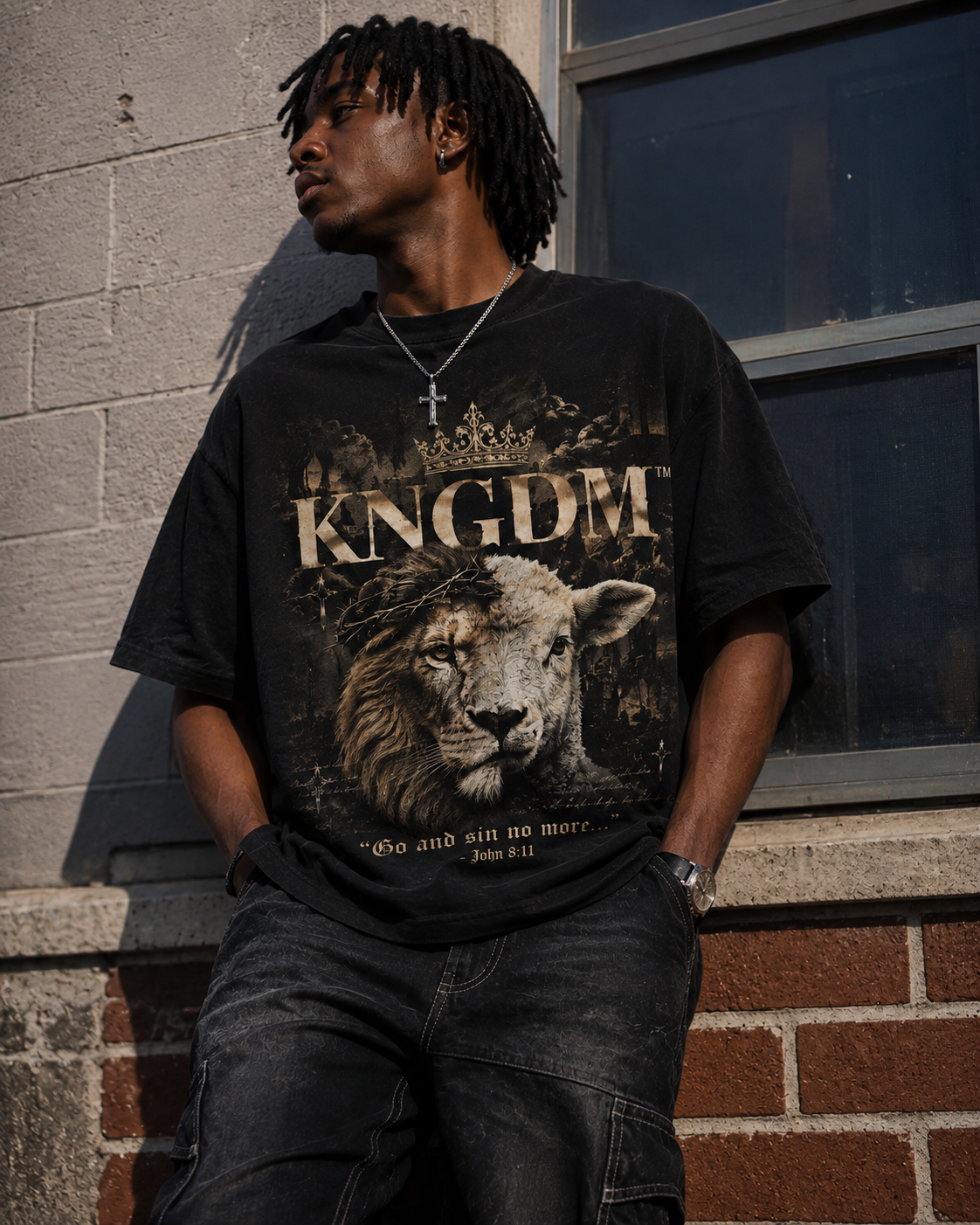 KNGDM Graphic Black Tee — lion and lamb crown graphic on washed black oversized tee